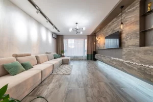 Contemporary living room with large beige sectional sofa